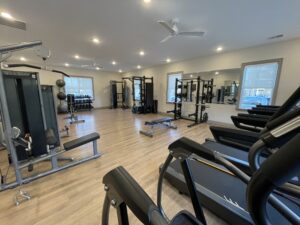 Interior photo of the fitness center at Marcella at Gateway Apartments in Bon Air, Virginia